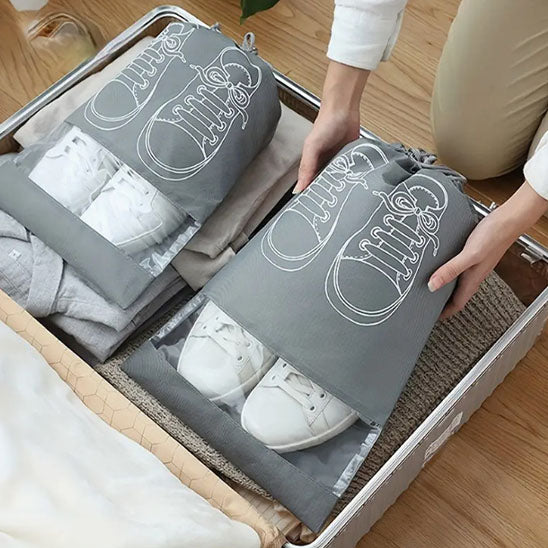 range chaussure voyageur compact rangement