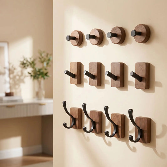 Comparatif des modèles de crochets muraux en noyer noir : variantes rond, oblique et double pour une décoration d'intérieur en bois massif.