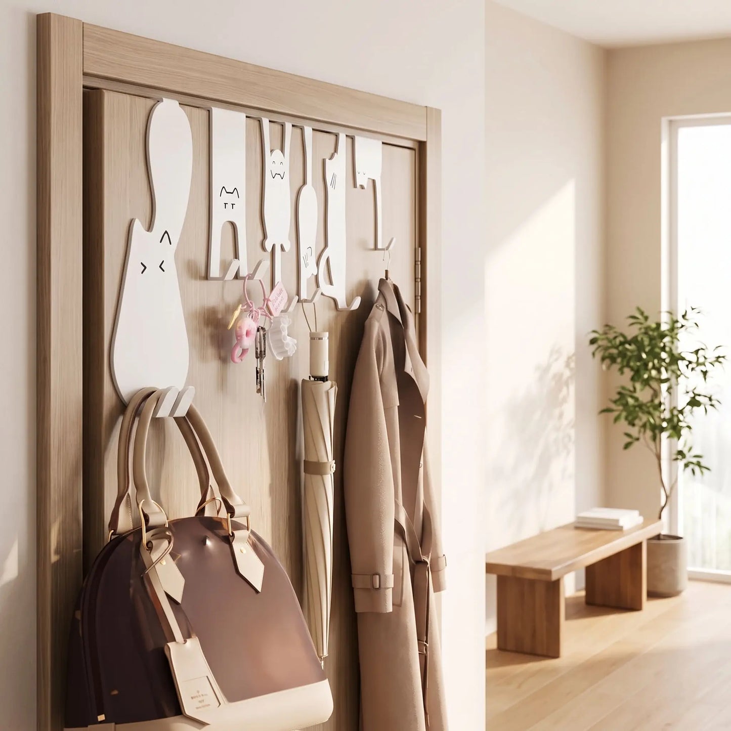Crochets de porte sans perçage en forme de chat, parfaits pour organiser manteaux, sacs et parapluies.