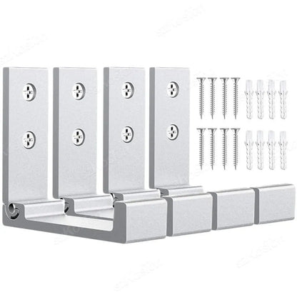 Ensemble de 4 crochets muraux pliables Rangement Signature en aluminium argent sablé avec vis et chevilles de fixation.