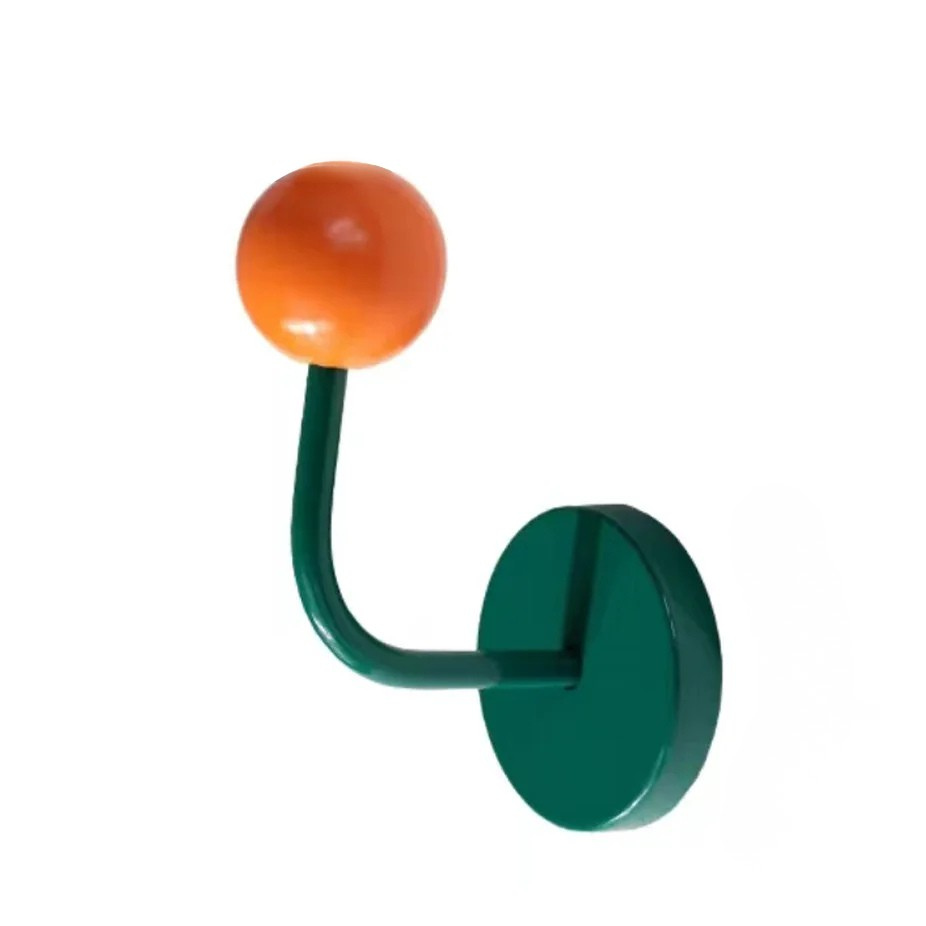 Patere magnétique sans perçage design coloré vert avec boule orange pour suspendre accessoires sur surface métallique