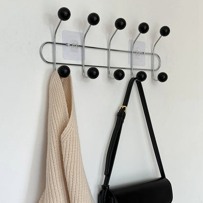 Patère porte-manteau murale design, modèle 5 crochets noirs, style industriel et vintage pour une entrée moderne.