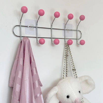 Patère porte-manteau murale design, modèle 5 crochets roses, style moderne et élégant pour une entrée ou une chambre d'enfant.