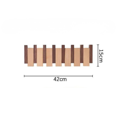 Porte-manteau mural Modulo™ en bois massif bicolore (hêtre et noyer noir) avec 6 patères rétractables dans une entrée organisée.