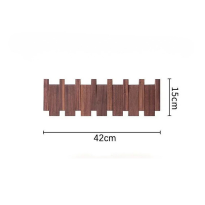 Porte-manteau mural design Modulo™ en bois de noyer noir massif avec 6 crochets rabattables.
