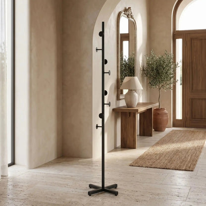 porte‑manteau sur pied noir dans entrée moderne avec console bois